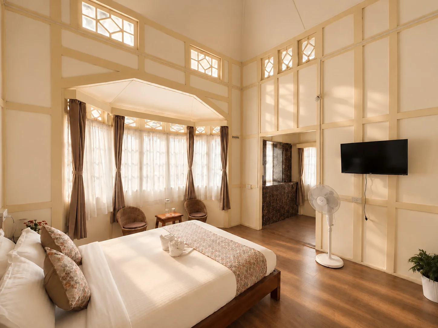 Vanilla Twilight with its timber bed, bay-window seating and television.